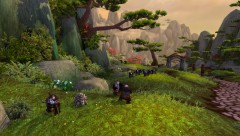 Pandaren_Hunter_with_Turtle_Pet_in_Wandering_Isle Caçador Pandaren com um pet tartaruga na Ilha Vagante